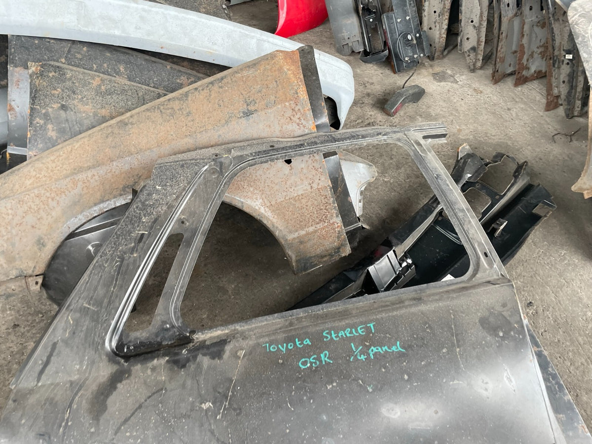TOYOTA STARLET MK4 P80 OSR DRIVER SIDE REAR QUARTER PANEL NEW OLD STOCK