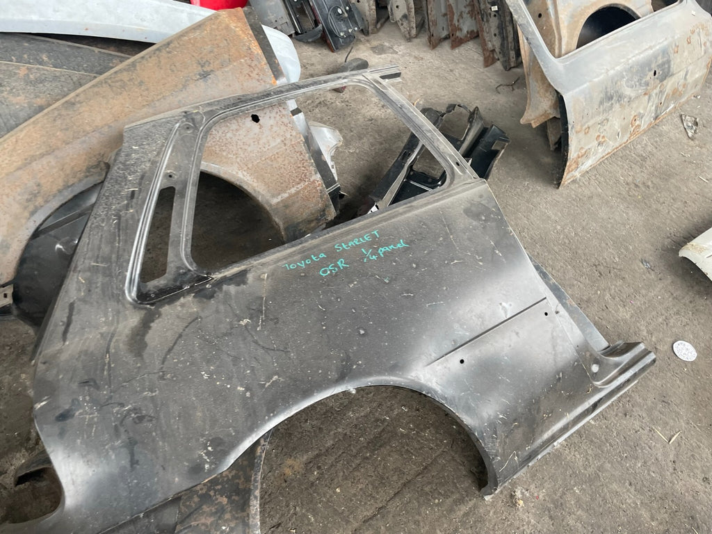 TOYOTA STARLET MK4 P80 OSR DRIVER SIDE REAR QUARTER PANEL NEW OLD STOCK