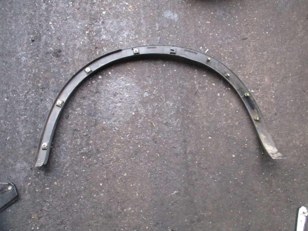 NISSAN QASHQAI J10 MK1 2012 OSR DRIVER SIDE REAR WHEEL ARCH TRIM 93828BR0