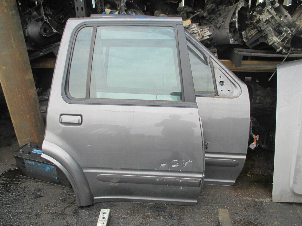 FORD EXPLORER 2000 OSR DRIVER SIDE REAR COMPLETE DOOR PLATINUM METALLIC