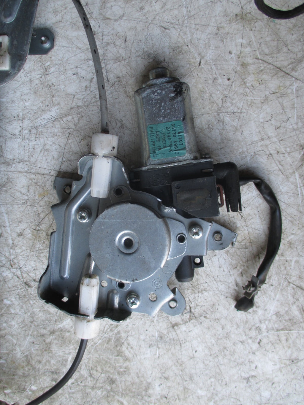 NISSAN X TRAIL OSR DRIVER SIDE WINDOW MOTOR REGULATOR 807308991C 2174075A