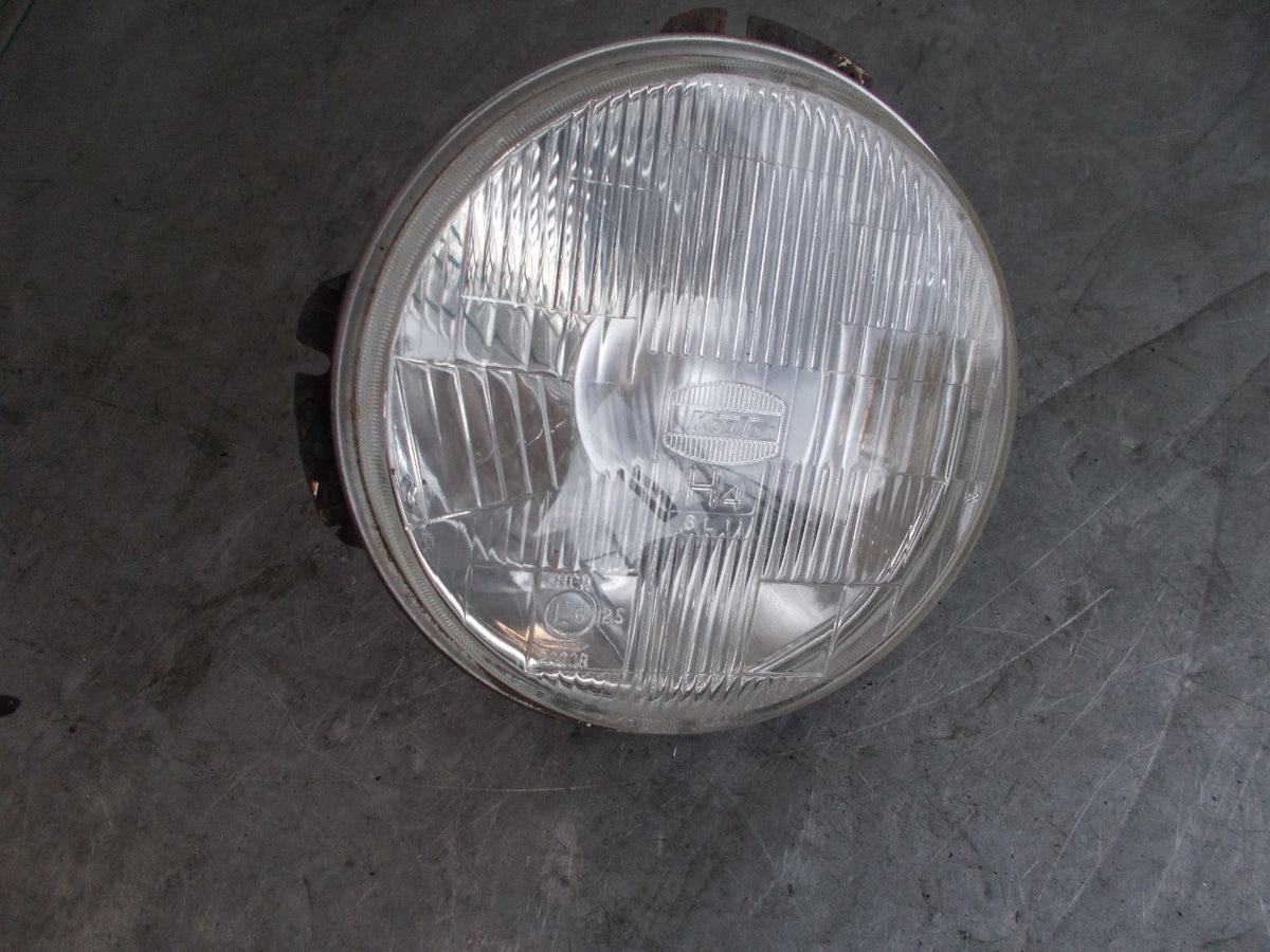 MITSUBISHI SHOGUN MK1 1987 NS PASSENGER HEADLIGHT HEADLAMP FRONT LIGHT GLASS