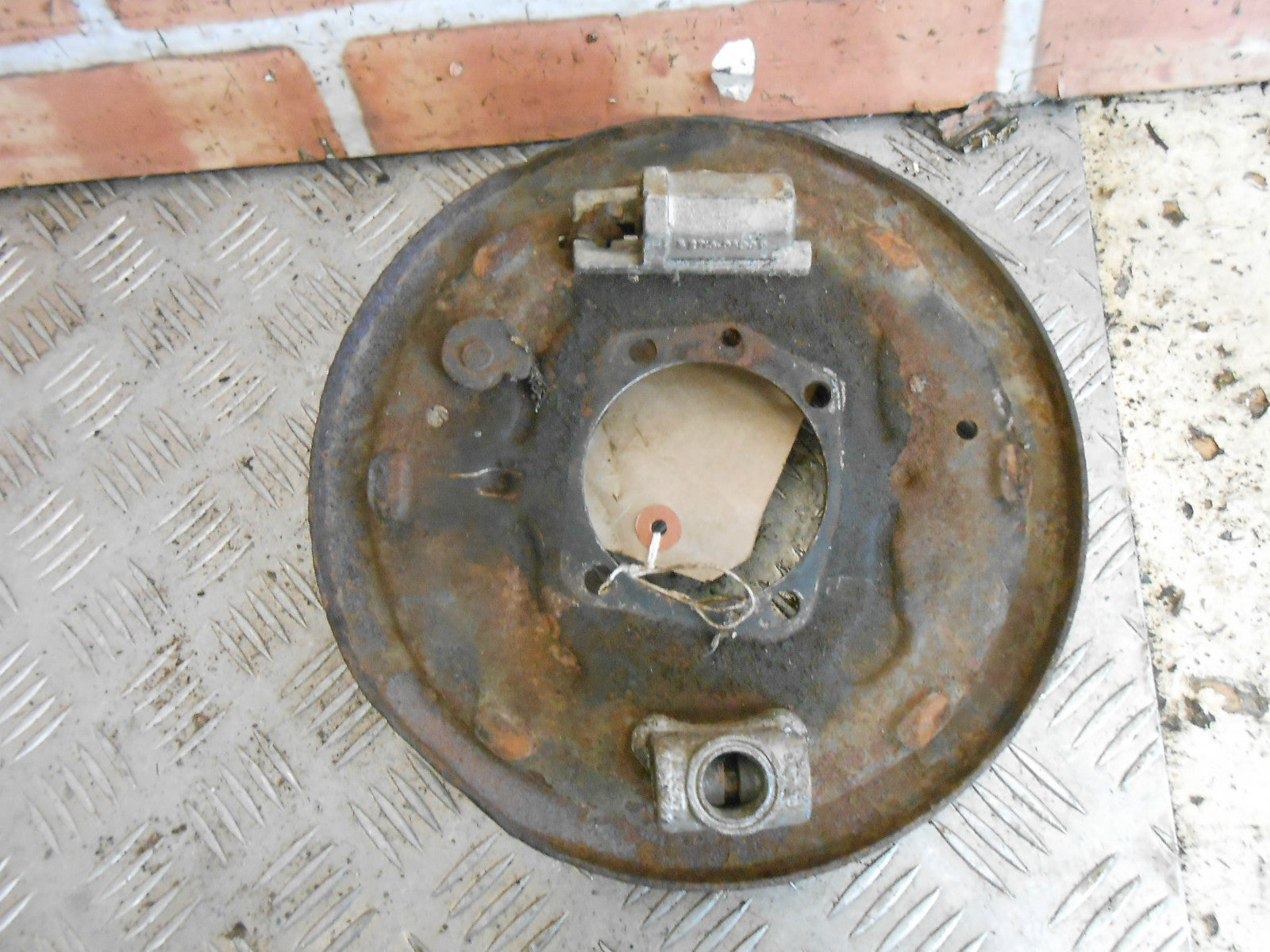 FORD PREFECT 107E 1959 NSR PASSENGER SIDE REAR STEEL BRAKE PLATE