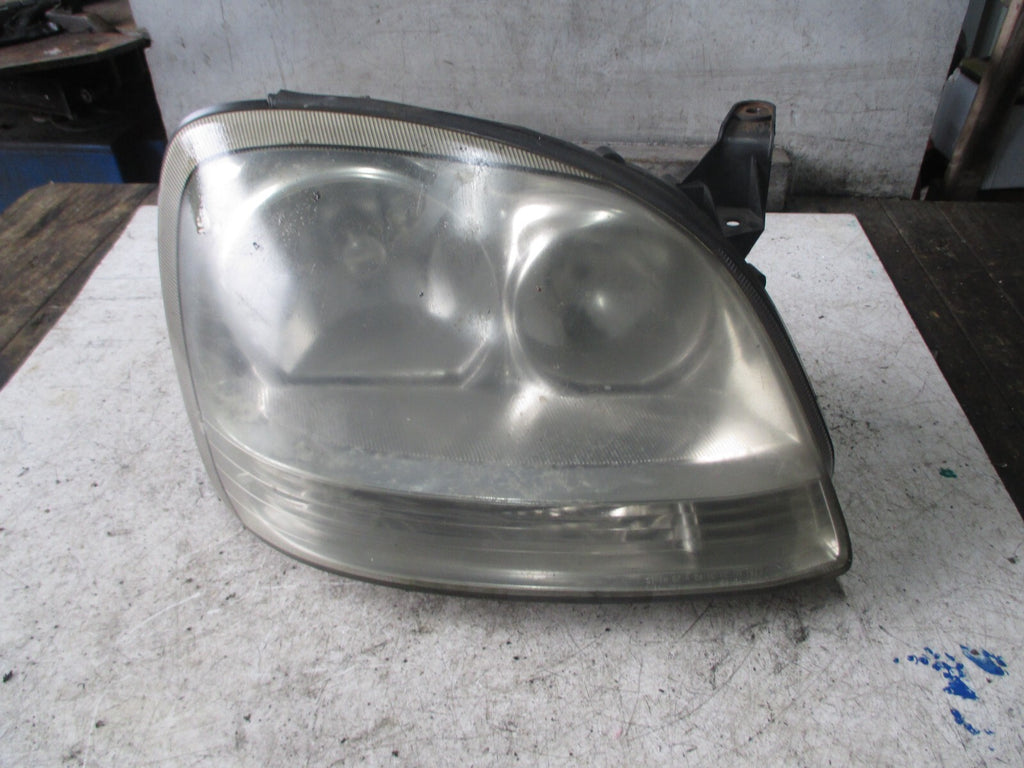 NISSAN ALMIRA 2004 OSF DRIVER SIDE HEADLIGHT