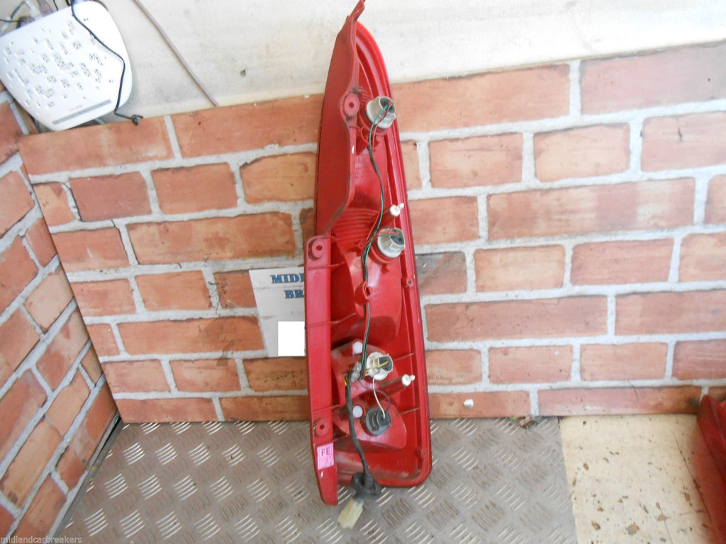DAEWOO TACUMA 2004 NSR PASSENGER SIDE REAR BRAKE TAIL LIGHT CLUSTER