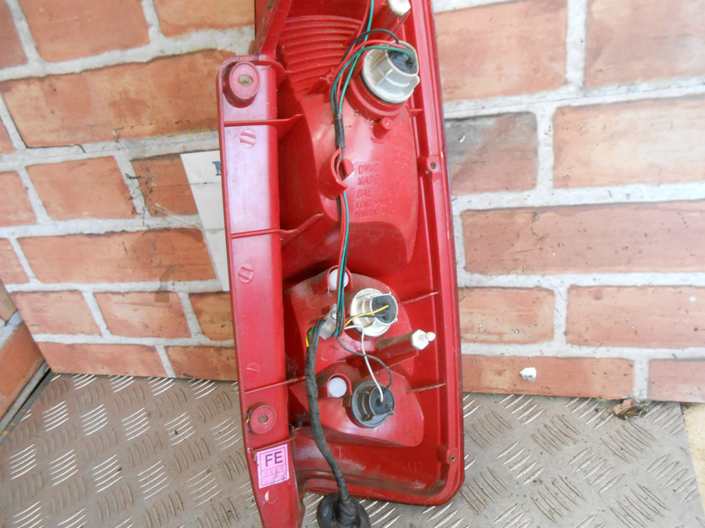 DAEWOO TACUMA 2004 NSR PASSENGER SIDE REAR BRAKE TAIL LIGHT CLUSTER