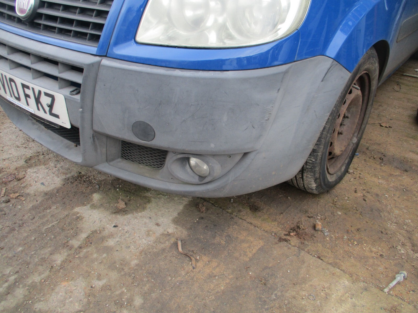 2010 FIAT DOBLO MK1 FRONT BUMPER WITH FOG LIGHT