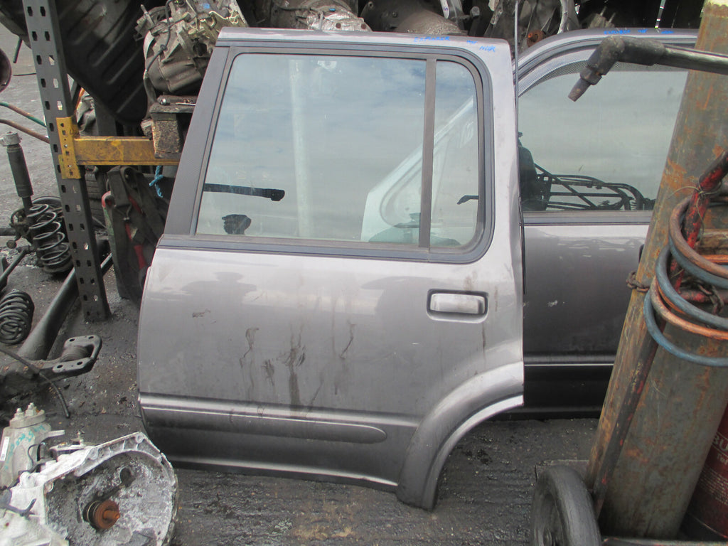 FORD EXPLORER 2000 NSR PASSENGER SIDE REAR COMPLETE DOOR PLATINUM METALLIC