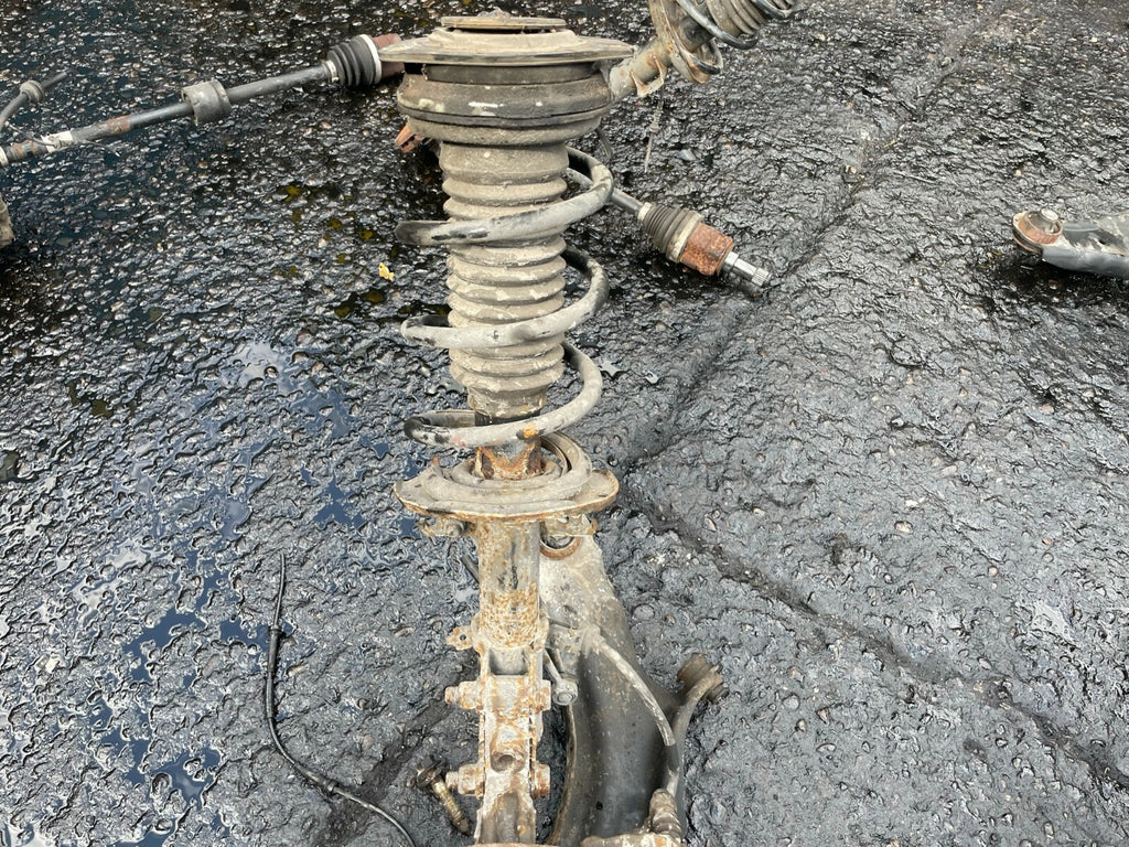 2013 RENAULT KANGOO MK2 1.5 DIESEL OS DRIVER SIDE SHOCK SPRING HUB LEG ARM