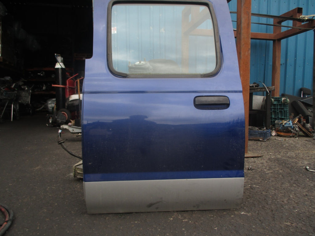 2002 NISSAN NAVARA D22 NSR PASSENGER SIDE REAR COMPLETE DOOR BLUE