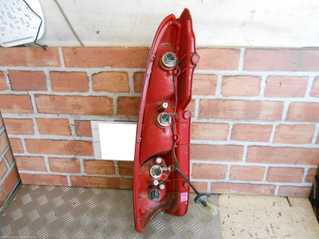 DAEWOO TACUMA 2004 OSR DRIVER SIDE REAR BRAKE TAIL LIGHT CLUSTER