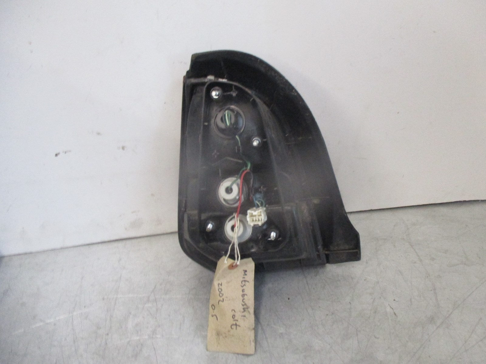 Mitsubishi Colt 2002 0431679 driver side rear brake stop tail light