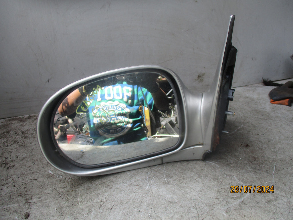 2006 KIA SEDONA  NSF PASSENGER SIDE WING MIRROR SILVER