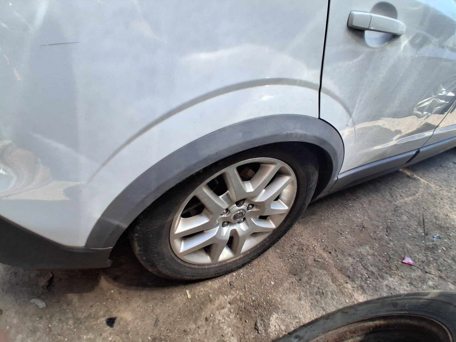 2015 VAUXHALL ANTARA MK1 OSR DRIVER SIDE REAR WHEEL ARCH TRIM