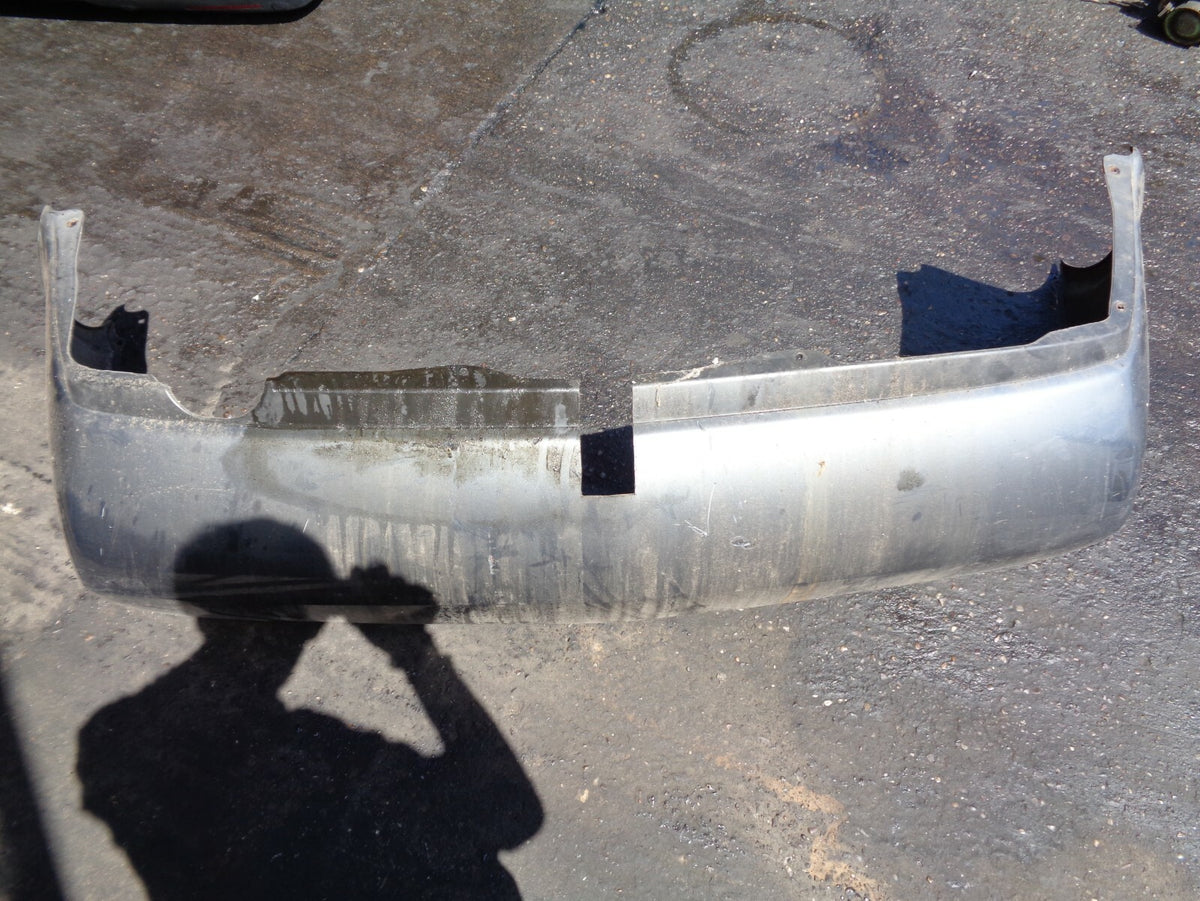 NISSAN PRIMERA 2004 MK1 REAR BUMPER WITH TOW BAR CUT GREY