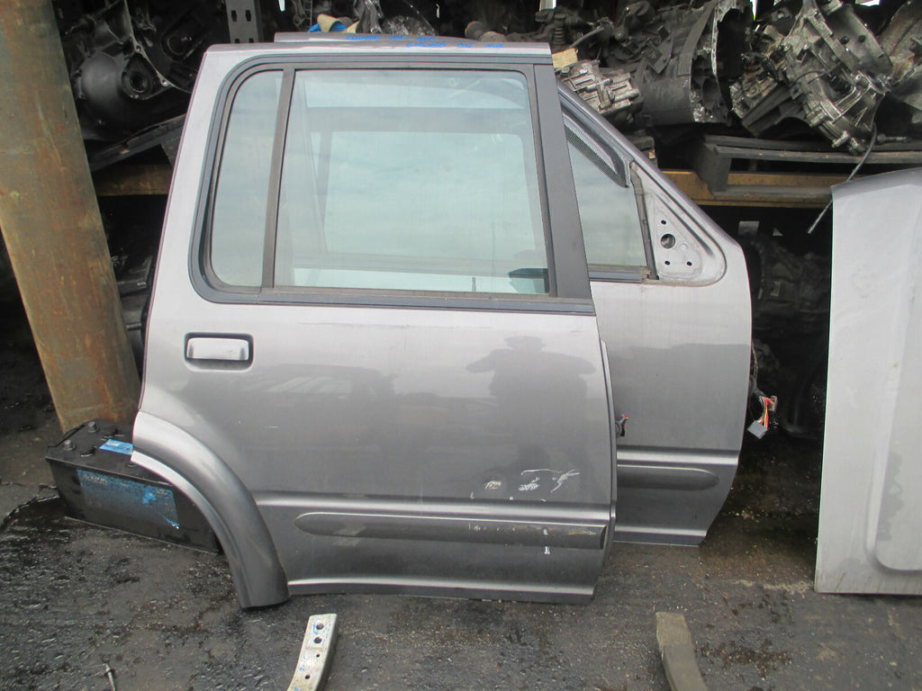 FORD EXPLORER 2000 OSR DRIVER SIDE REAR COMPLETE DOOR PLATINUM METALLIC