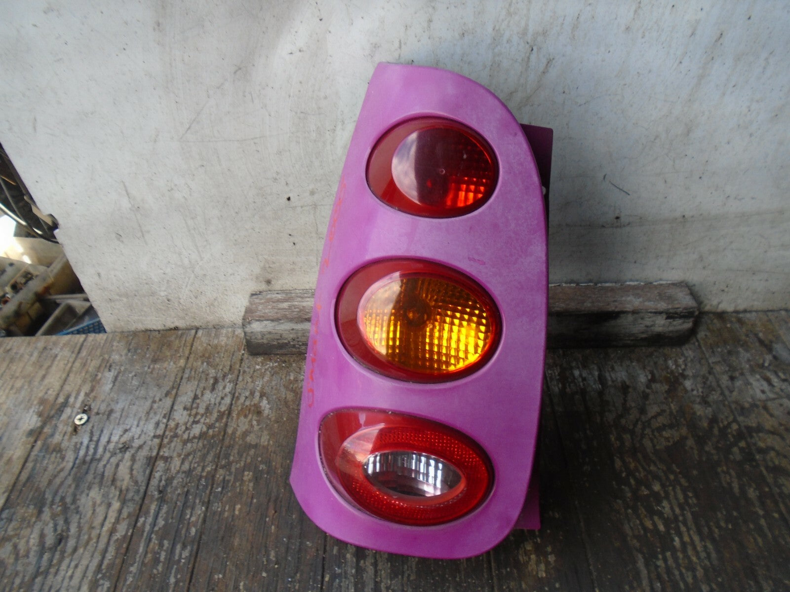 SMART CITY COUPE NSR REAR PASSENGER SIDE TAIL LIGHT TAIL LAMP WITH FRAME 0011644