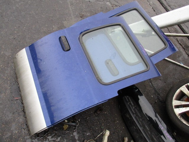 NISSAN NAVARA D22 2003 OSR DRIVER SIDE REAR COMPLETE DOOR BLUE 2Y9