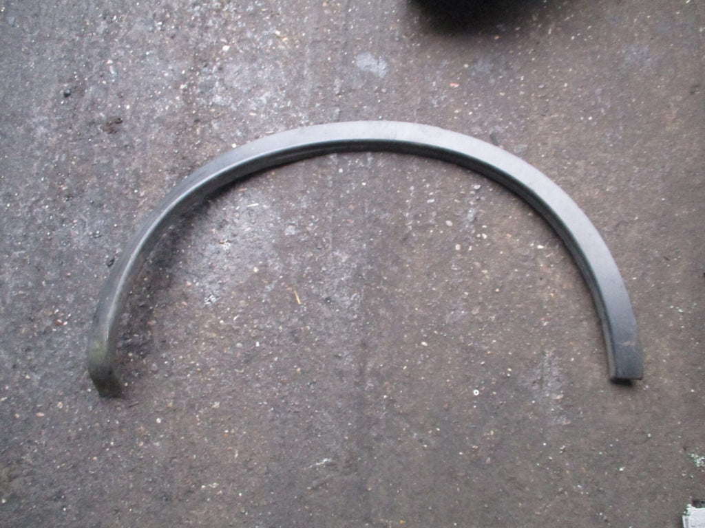 NISSAN QASHQAI J10 MK1 2012 OSR DRIVER SIDE REAR WHEEL ARCH TRIM 93828BR0