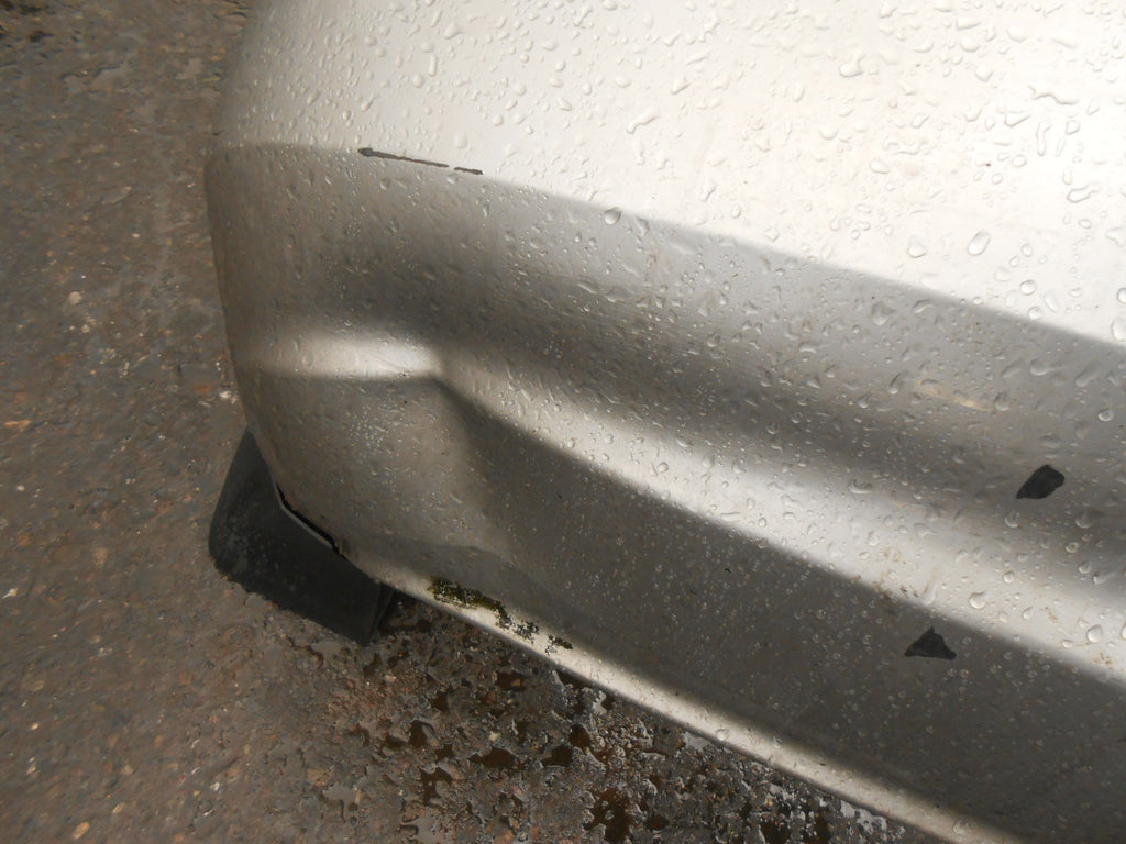 KIA CARENS MK2 FACELIFT 2004 REAR BACK PLASTIC BUMPER SILVER DAMAGED