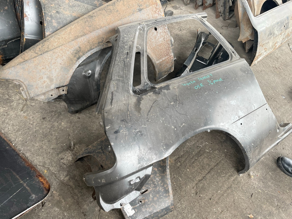 TOYOTA STARLET MK4 P80 OSR DRIVER SIDE REAR QUARTER PANEL NEW OLD STOCK
