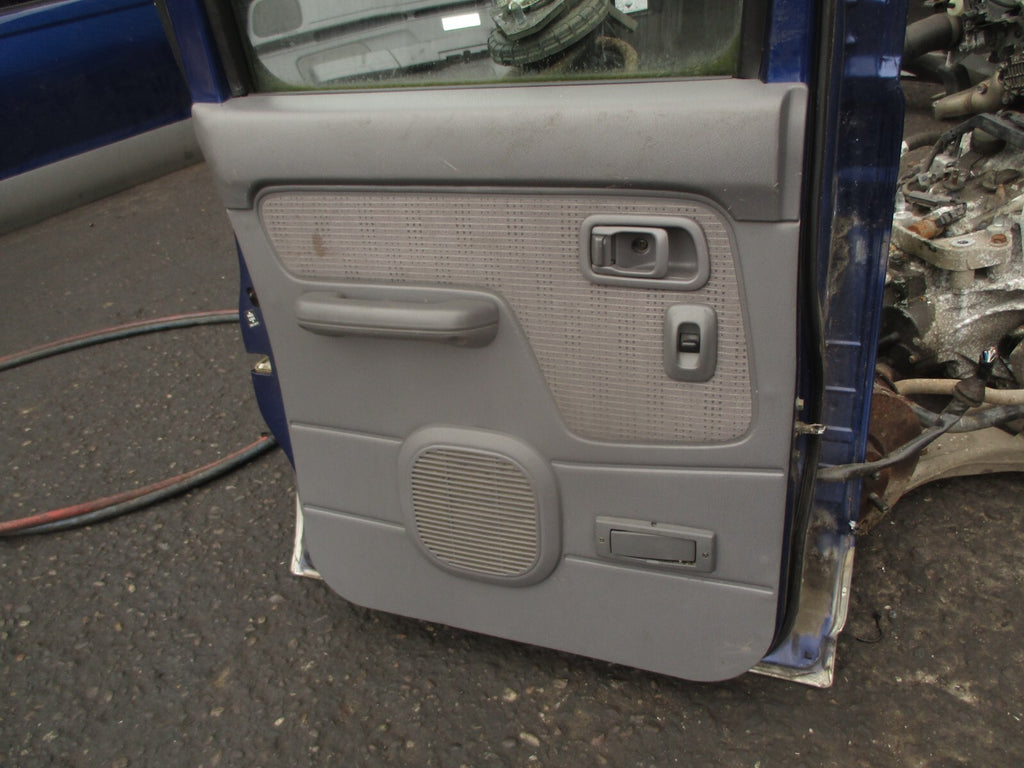 2002 NISSAN NAVARA D22 NSR PASSENGER SIDE REAR COMPLETE DOOR BLUE