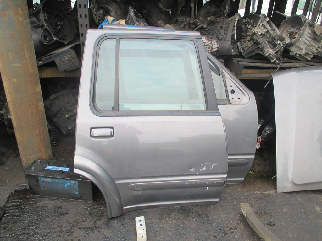 FORD EXPLORER 2000 OSR DRIVER SIDE REAR COMPLETE DOOR PLATINUM METALLIC