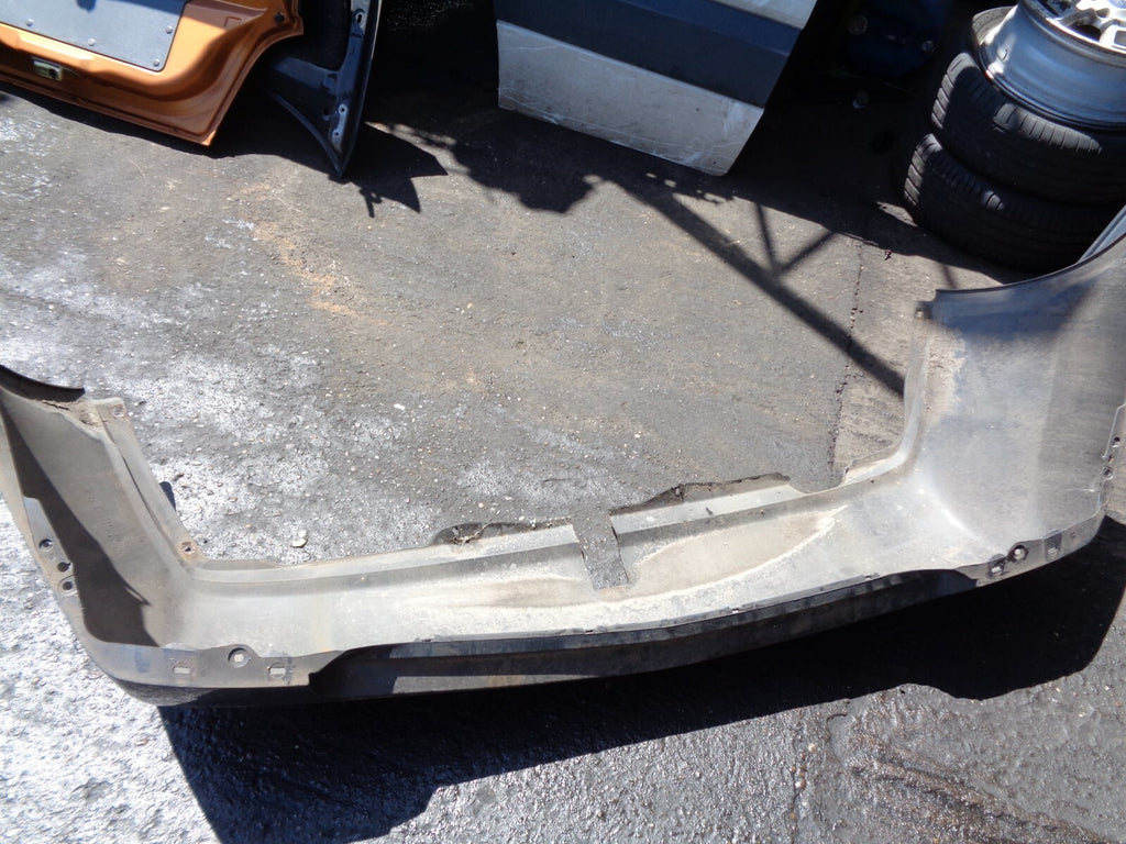 NISSAN PRIMERA 2004 MK1 REAR BUMPER WITH TOW BAR CUT GREY