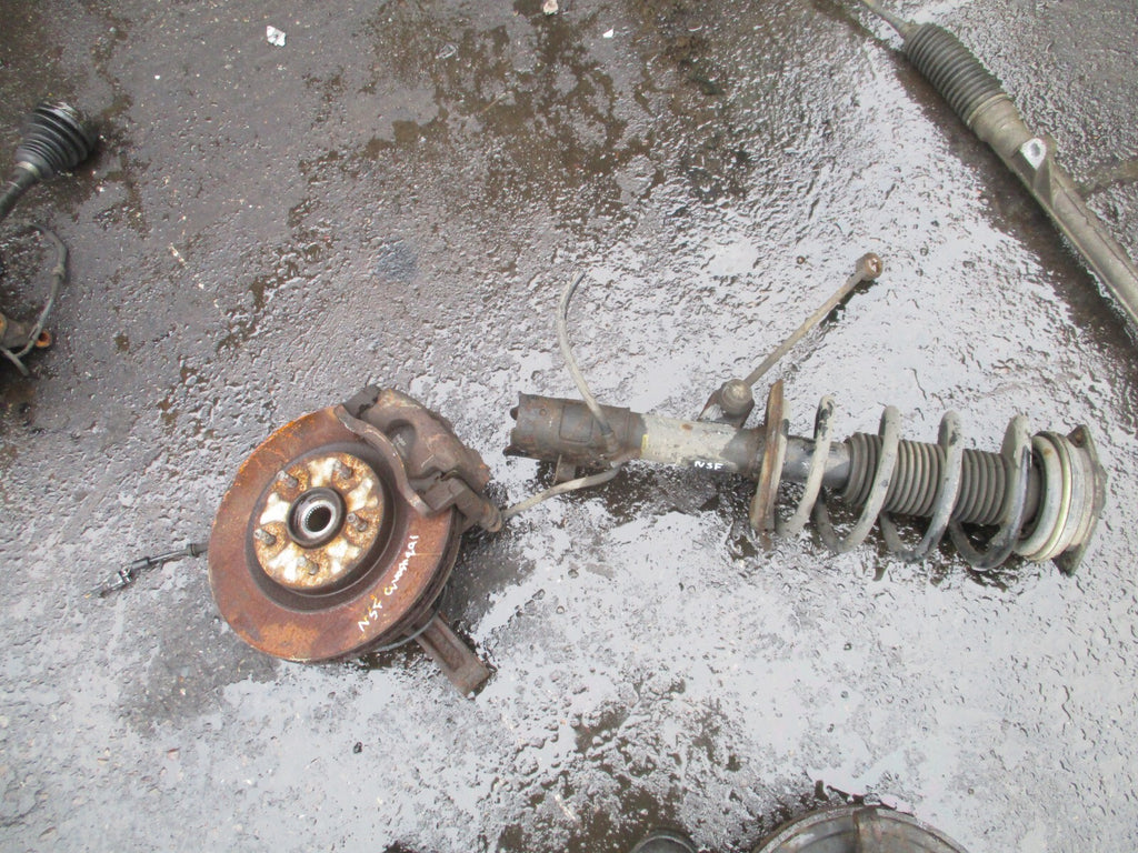 NISSAN QASHQAI J10 2011 1.5 DIESEL NSF PASSENGER FRONT HUB & SHOCK ABSORBER