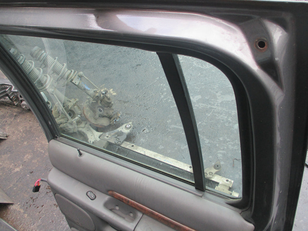 FORD EXPLORER 2000 OSR DRIVER SIDE REAR COMPLETE DOOR PLATINUM METALLIC