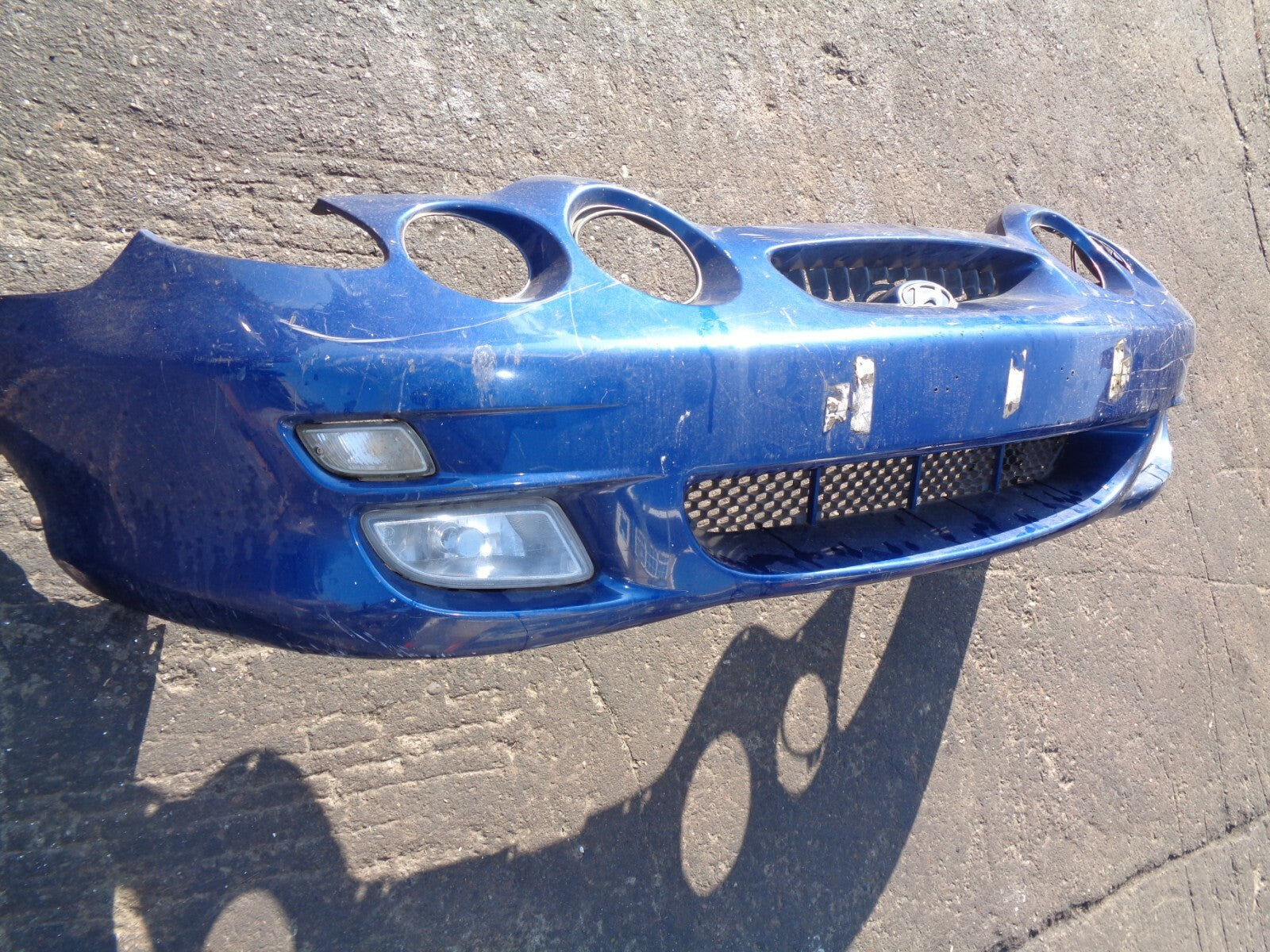 HYUNDAI COUPE BLUE FRONT BUMPER WITH FOG LIGHTS AND INDICATORS 1999 -2000 MK1