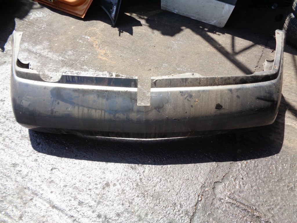 NISSAN PRIMERA 2004 MK1 REAR BUMPER WITH TOW BAR CUT GREY