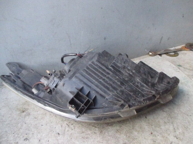 2009 MAZDA OSF DRIVER SIDE FRONT HEADLIGHT HEADLAMP D65151040