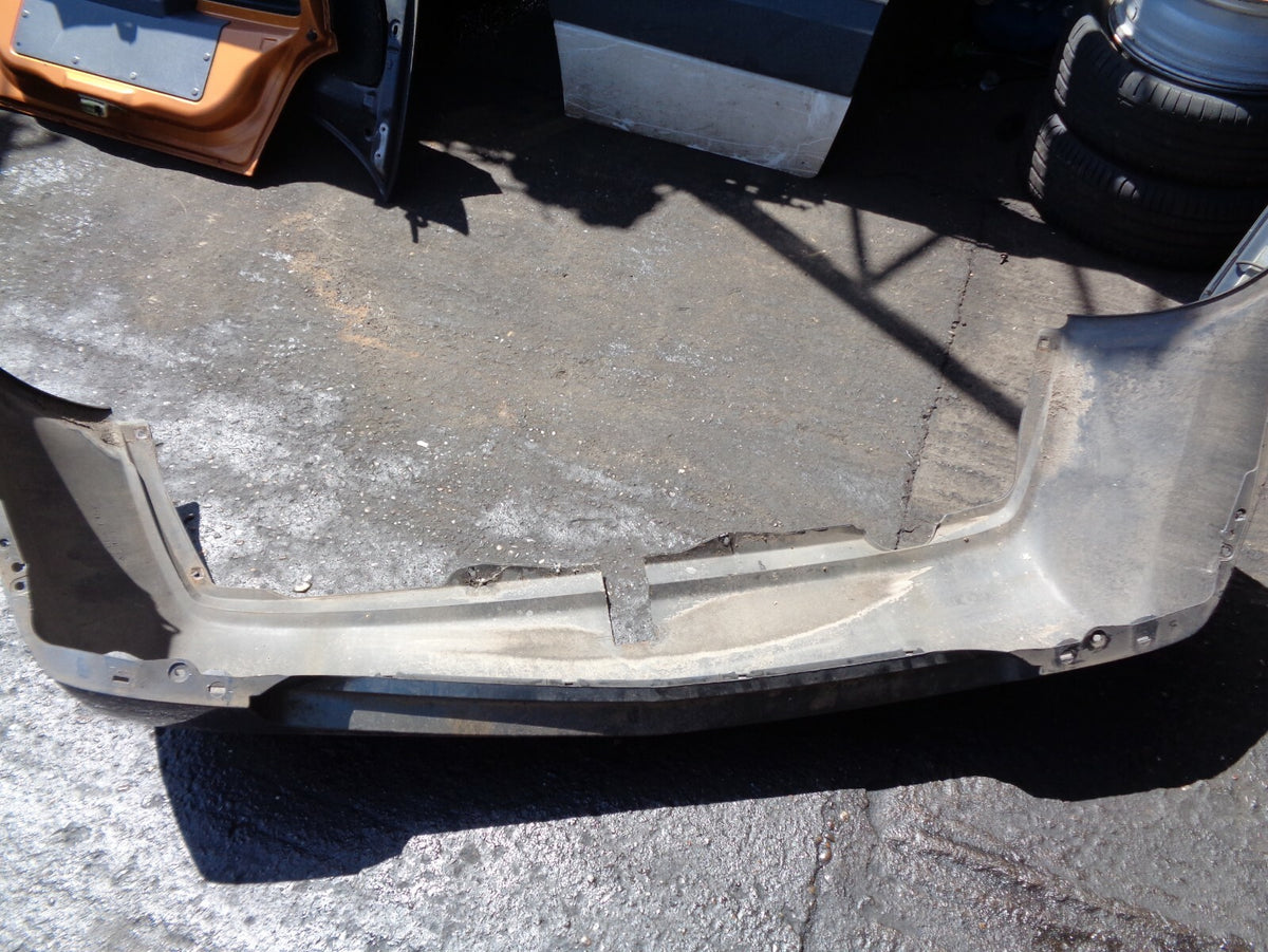 NISSAN PRIMERA 2004 MK1 REAR BUMPER WITH TOW BAR CUT GREY